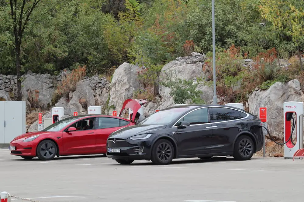 Tesla Cars At Supercharger